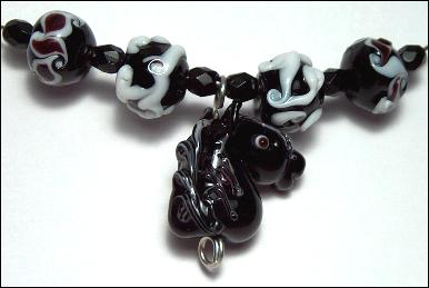 (image for) Ebony horse lampwork glass bead set